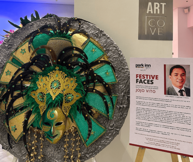 Festive Faces_The Esmeralda Mask and Jojo Vito_s Artist Profile at the entrance of Art Cove